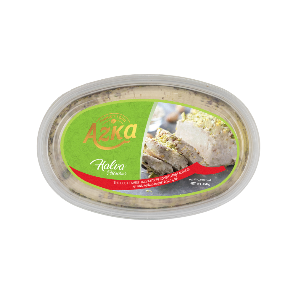 "حلاوة الفستق المجروشة من أزكى – حلاوة سمسم ناعمة مع قطع فستق مقرمشة، مثالية للضيافة"