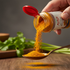 "Azka Premium Turmeric Powder 70 g – finely ground turmeric for everyday cooking with natural flavor"